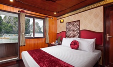 A bed or beds in a room at Rosa Cruise